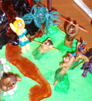 The virgin sacrifice and villagers were hand-crafted from marzipan by Rachel Tallent.