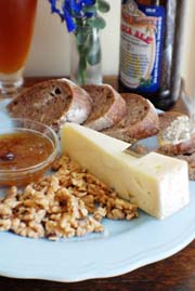 Cheese and beer pairing: Montgomery's English farmhouse cheddar and Samuel Smith's Ale appetizer cheese tray. Beyond Wonderful Cheese Expert, Mark "The Cheese Dude" Todd.