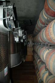 Tanks for the memories: modern open-top fermenting tanks used for ultra-premium red production stand next to old-world hand-made Burgundy barrels at Hook & Ladder Winery. Beyond Wonderful Wine Expert, Michael De Loach.