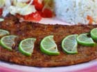 Plate the Mexican Carne with extra limes.